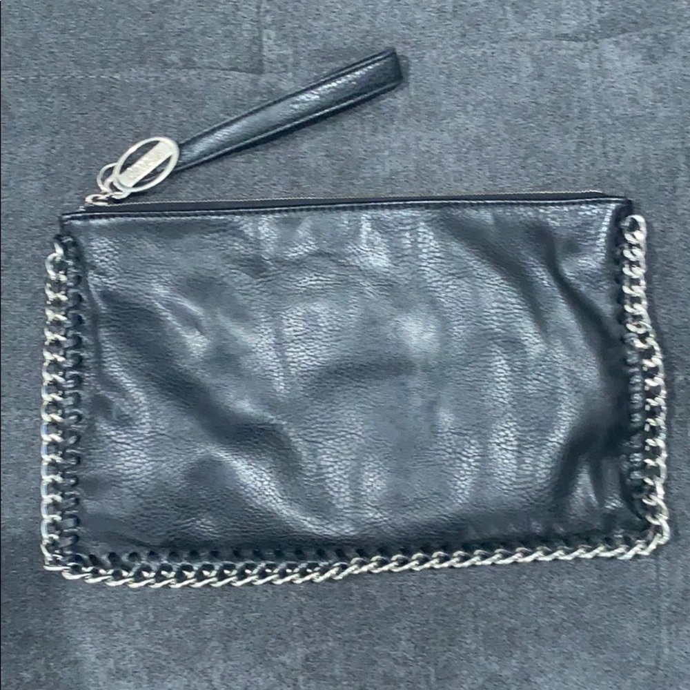 Carlos Santana wristlet